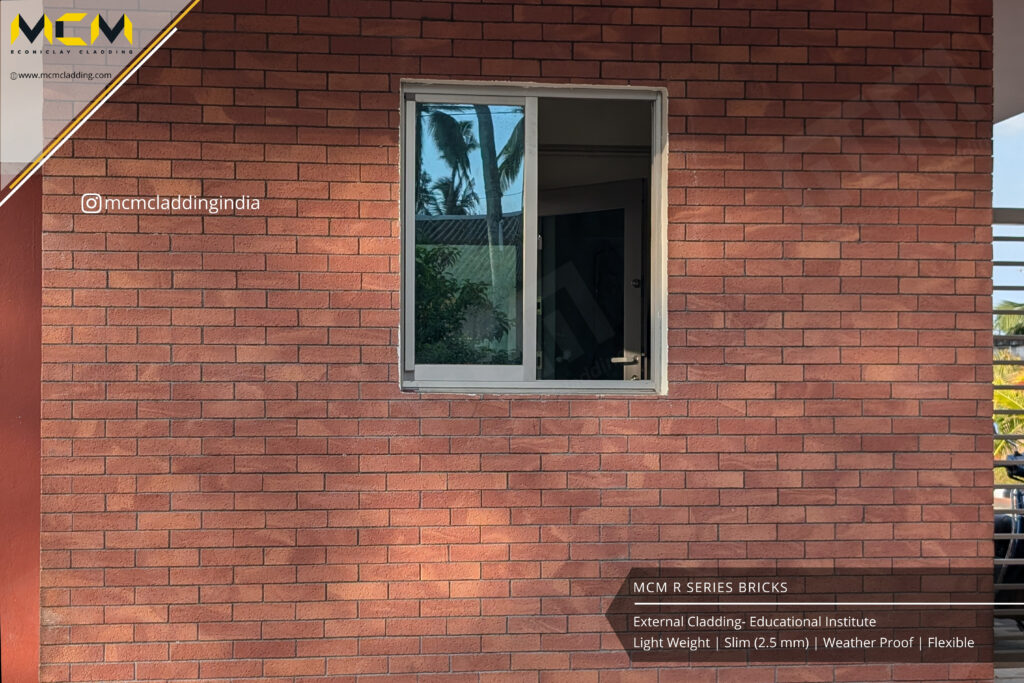 A wall covered with reddish-brown R series bricks. MCM Cladding - MCM Phomi India.